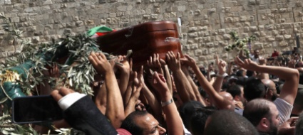 scontri-ai-funerali-della-reporter-uccisa